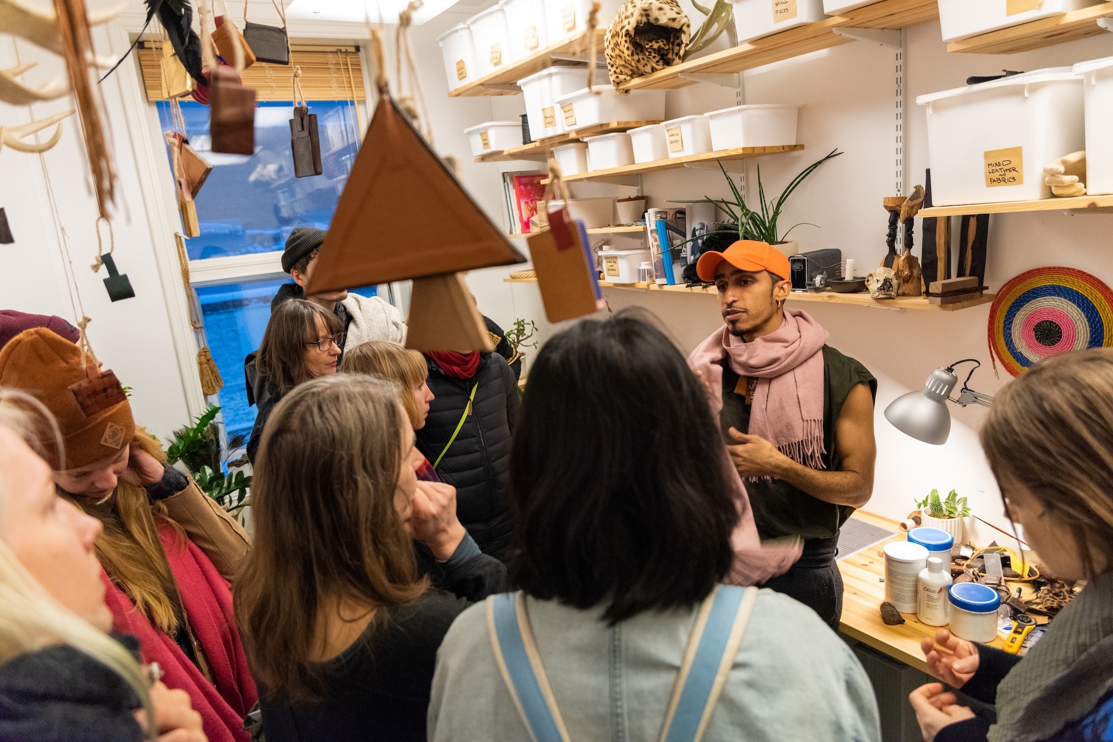 Artist with visitors in studio
