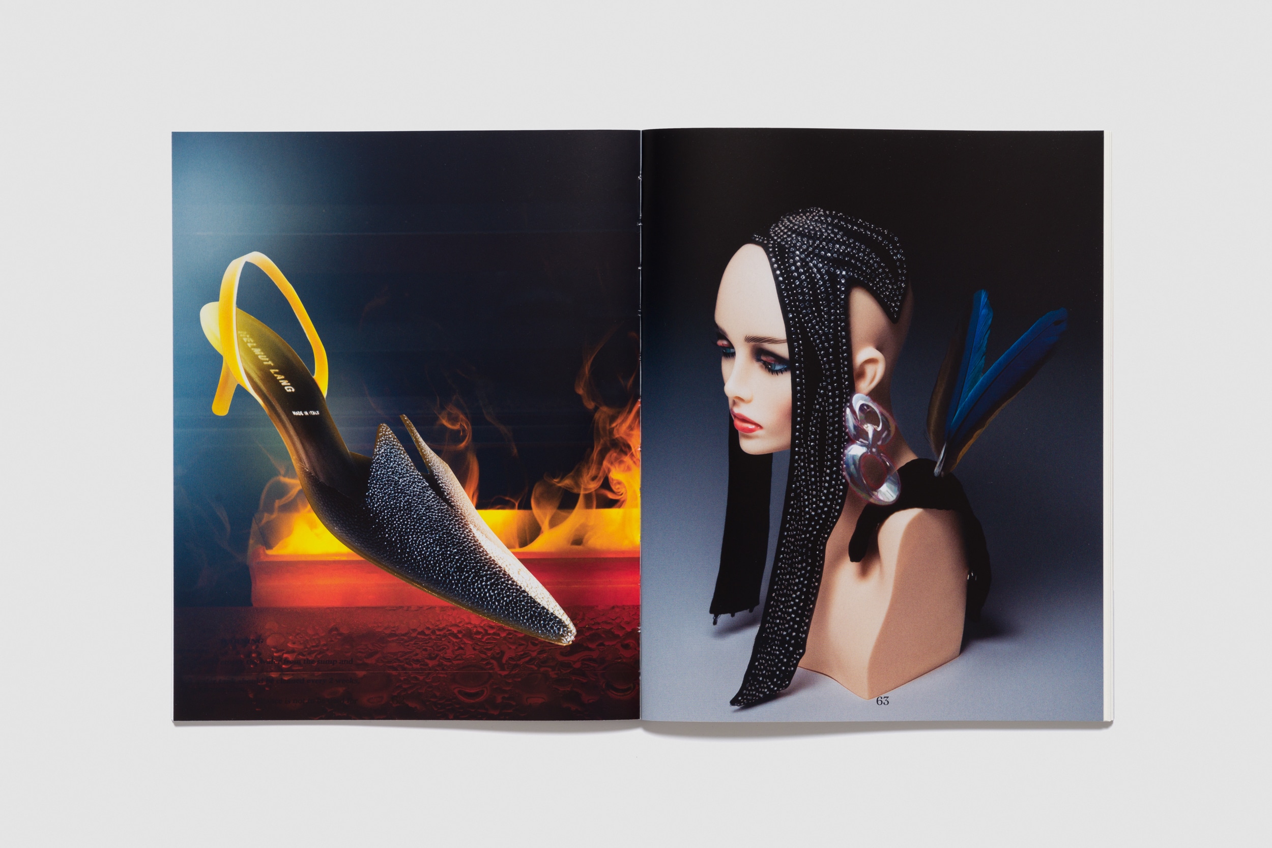 An open magazine with images of a mannequin head and a levitating show.