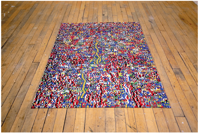 I created a prayer rug made out of military ribbons. The prayer rug has a symbolic meaning in some cultures and is cared for in a holy manner. By pairing two icons of power in human history, military and religion, my work explores the concept of power struggle and undermines the traditional paradigms of objects that exist within society.