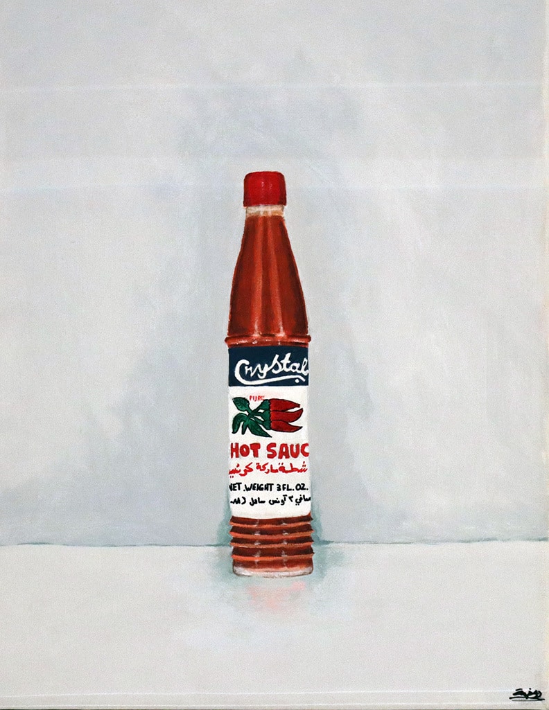 A still-life depiction of a glass hot sauce bottle marked with Arabic text, celebrating simple, familiar objects.