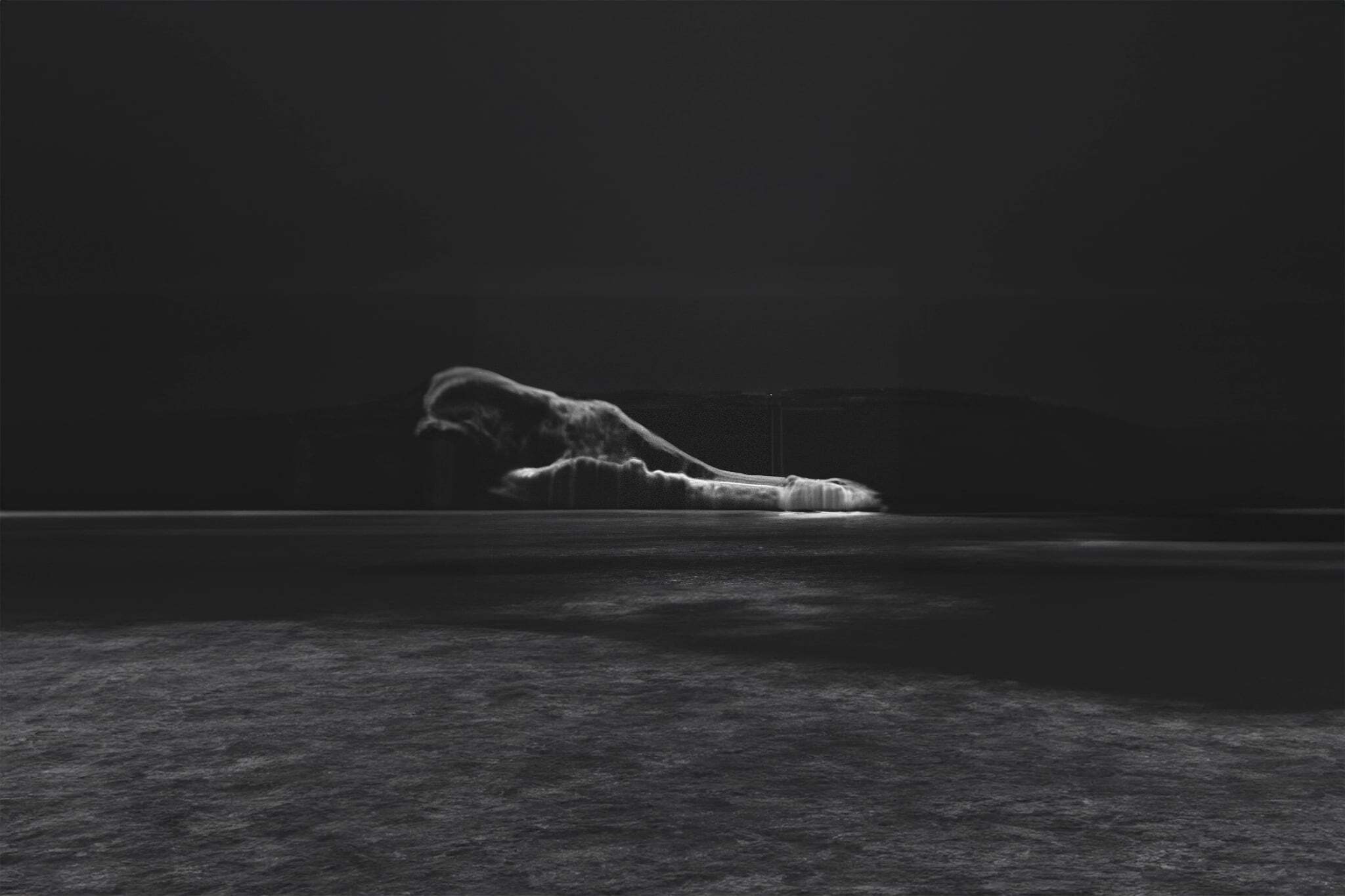 Black-and-white image based on a retinal photograph and digitally edited, showing a dark field with a low horizon and a pale, cloud-like form extending across the center.